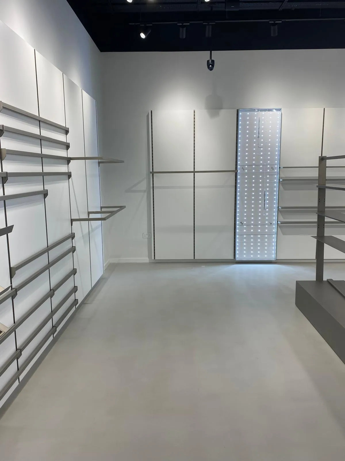 Wall shelving & power, Salomon Liverpool commercial fit-out by Aldridge Electrical